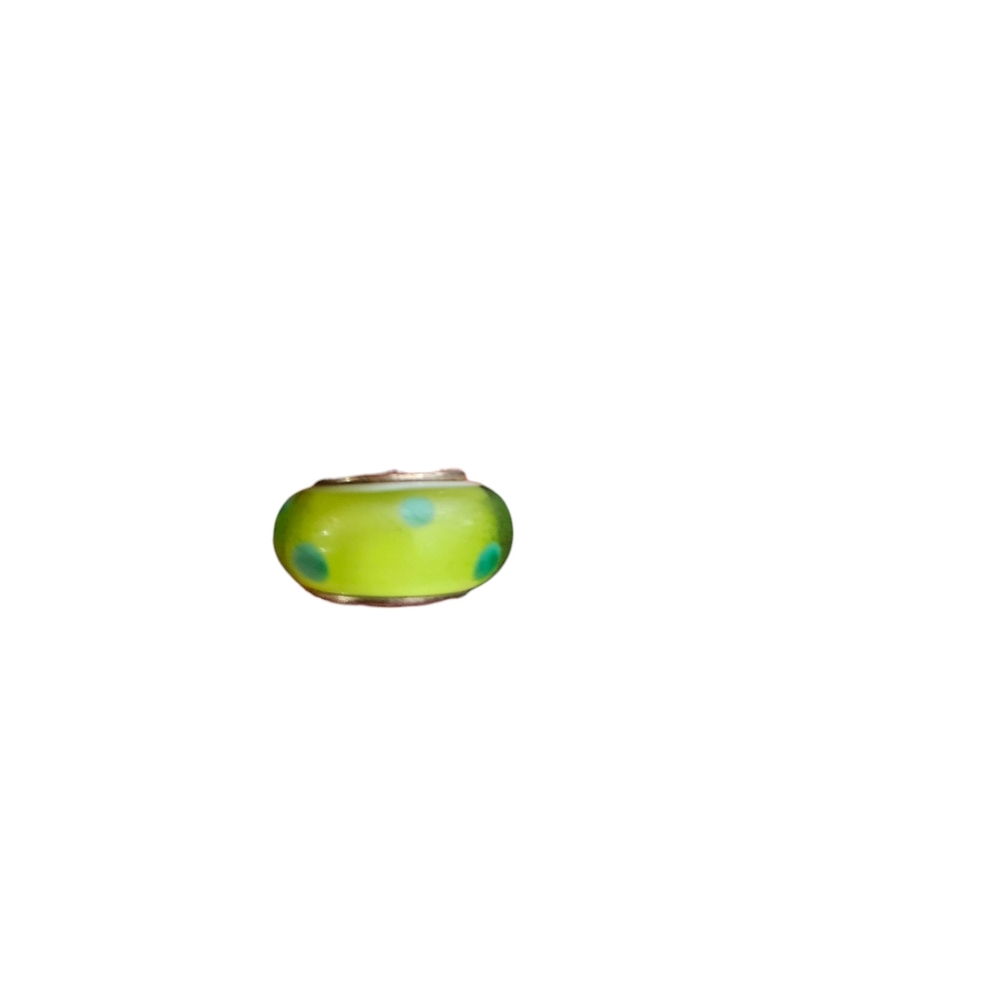 retired Pandora green Murano glass polka dot charm with a sterling silver core